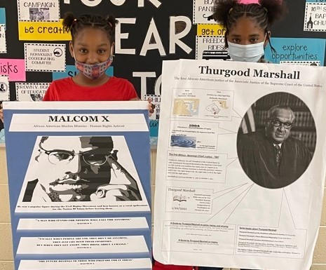 Dr. Wyche's Fifth graders present Black History culminating projects.