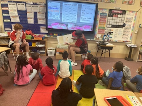 THS baseball players read to Harper students
